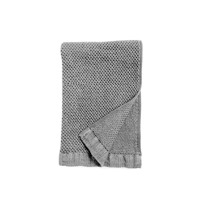 Vintage Waffle Hand Towel is 95% Cotton and 5% Linen. The highly absorbent, fast-drying threads are delicately woven into small plaits which maximise their absorbency and create an incredibly soft towel. Vintage Grey, 35cm x 85cm.