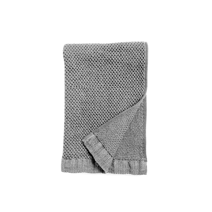 Vintage Waffle Hand Towel is 95% Cotton and 5% Linen. The highly absorbent, fast-drying threads are delicately woven into small plaits which maximise their absorbency and create an incredibly soft towel. Vintage Grey, 35cm x 85cm.